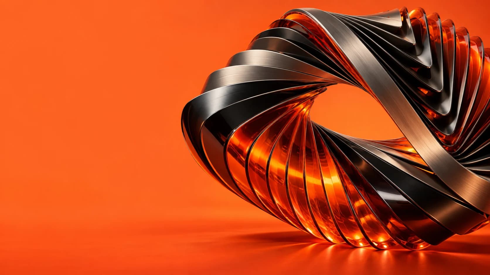 Orange glass and metal folded into a flowing sculptural form.